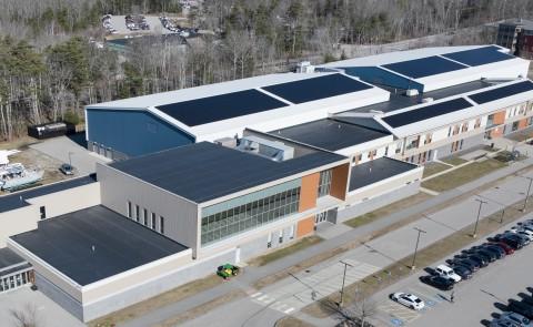 Aerial image of solar panels atop the Harold Alfond Forum